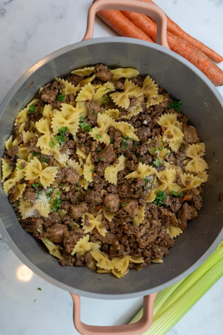 This White Bolognese Recipe is made with onion, carrots, celery, ground beef, sausage, white wine and porcini mushroom.