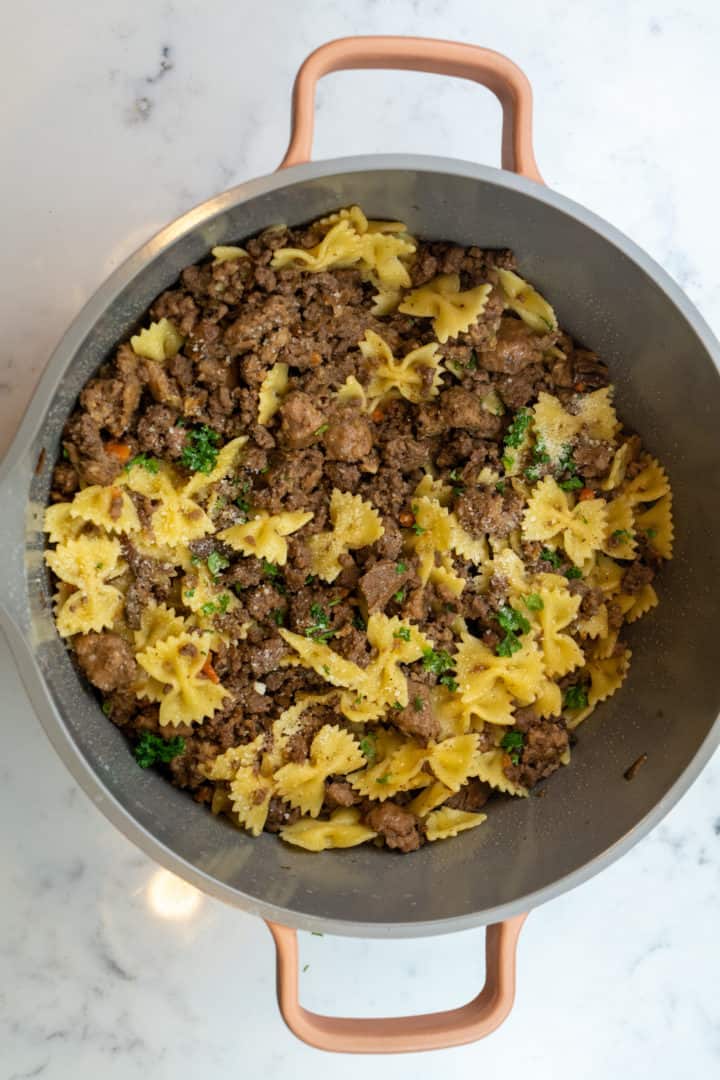 This Farfalle with Mushroom Bolognese sauce is made with onion, carrots, celery, ground beef, sausage, white wine and porcini mushroom. 