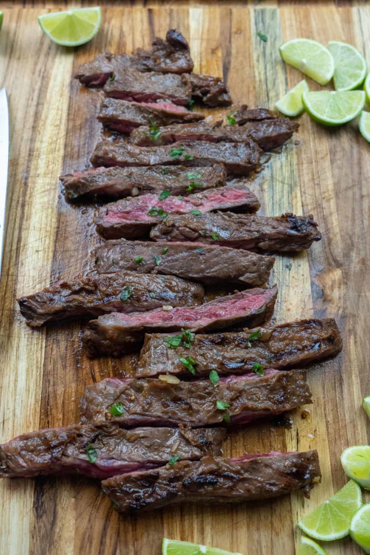 This Cast Iron Carne Asada is made with Ranchera Meat, olive oil, soy sauce, apple cider vinegar, jalapeños, onion, and limes.