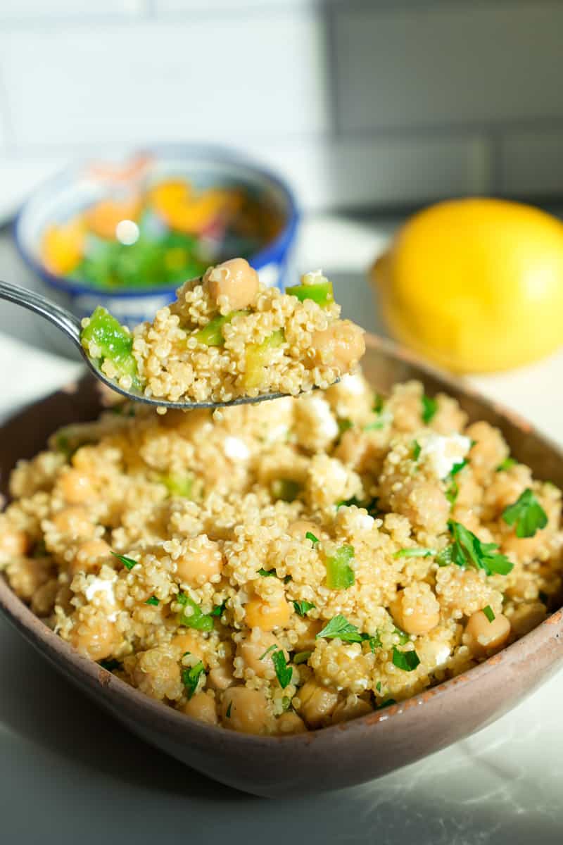 This Instant Pot Quinoa Recipe with Chickpeas is made with chickpeas, feta cheese, bell pepper, quinoa, chicken broth, and red wine vinegar.