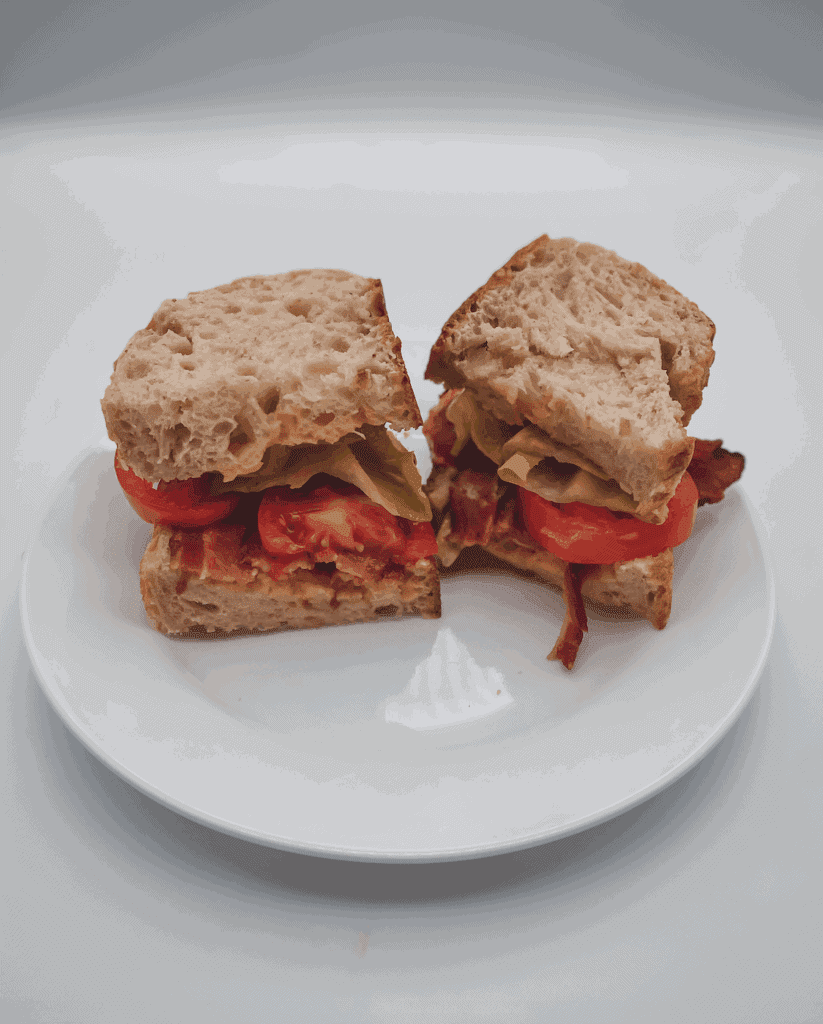 This BLT Sandwich with Spicy Mayo Sauce is made with sourdough bread, bacon, lettuce, tomatoes, and spicy mayo. 