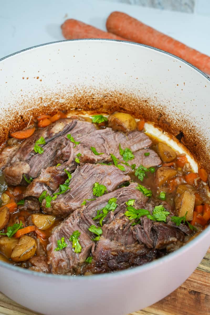 This Pork Pot Roast Recipe is a beef dish made by slow-cooking a usually tough cut of pork in a dutch oven, with vegetables.