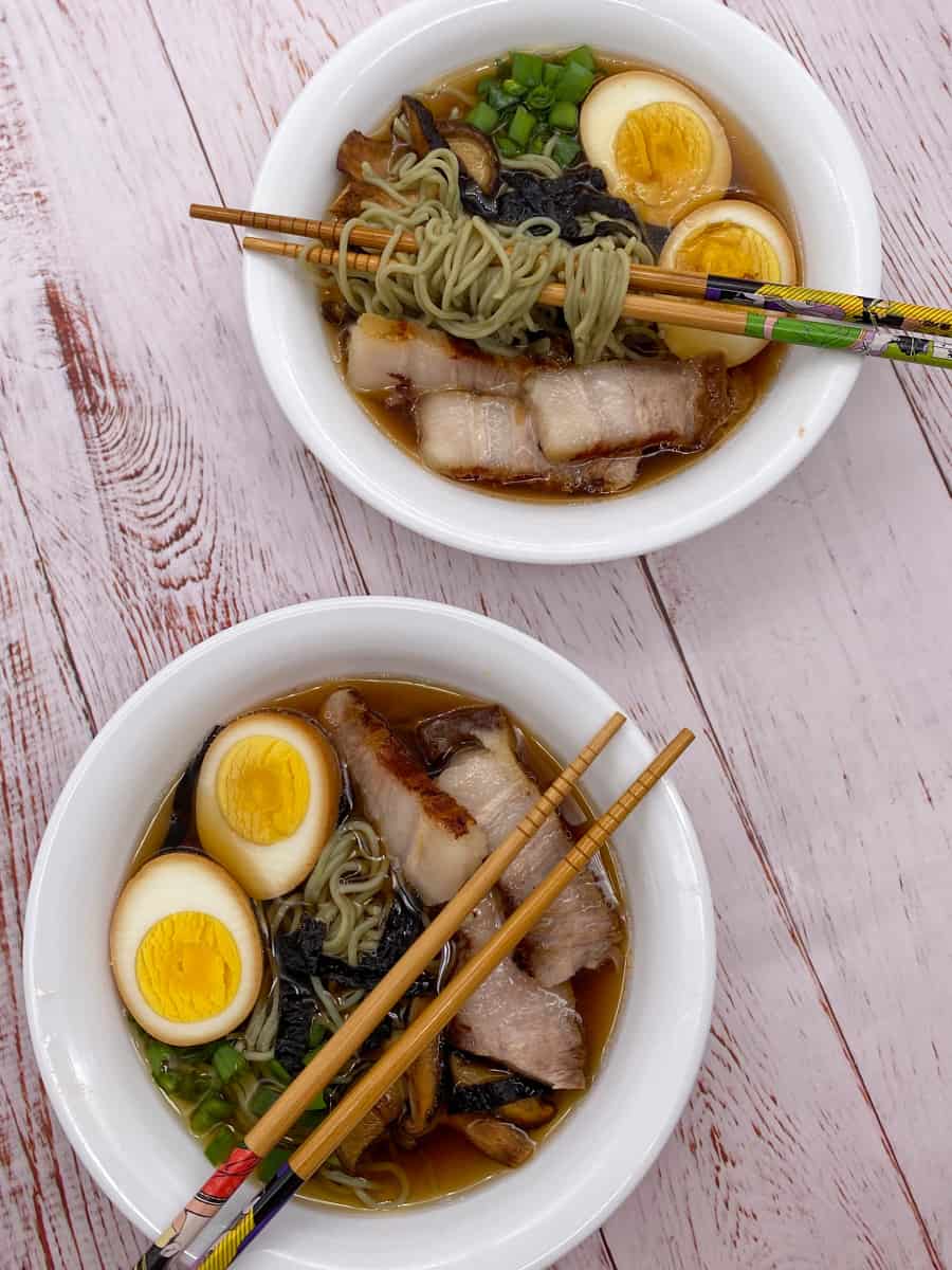 This Shoyu Ramen Recipe is made with pork belly, ramen, shitake mushrooms, kombu, bonito flakes, soft boiled eggs and scallions.