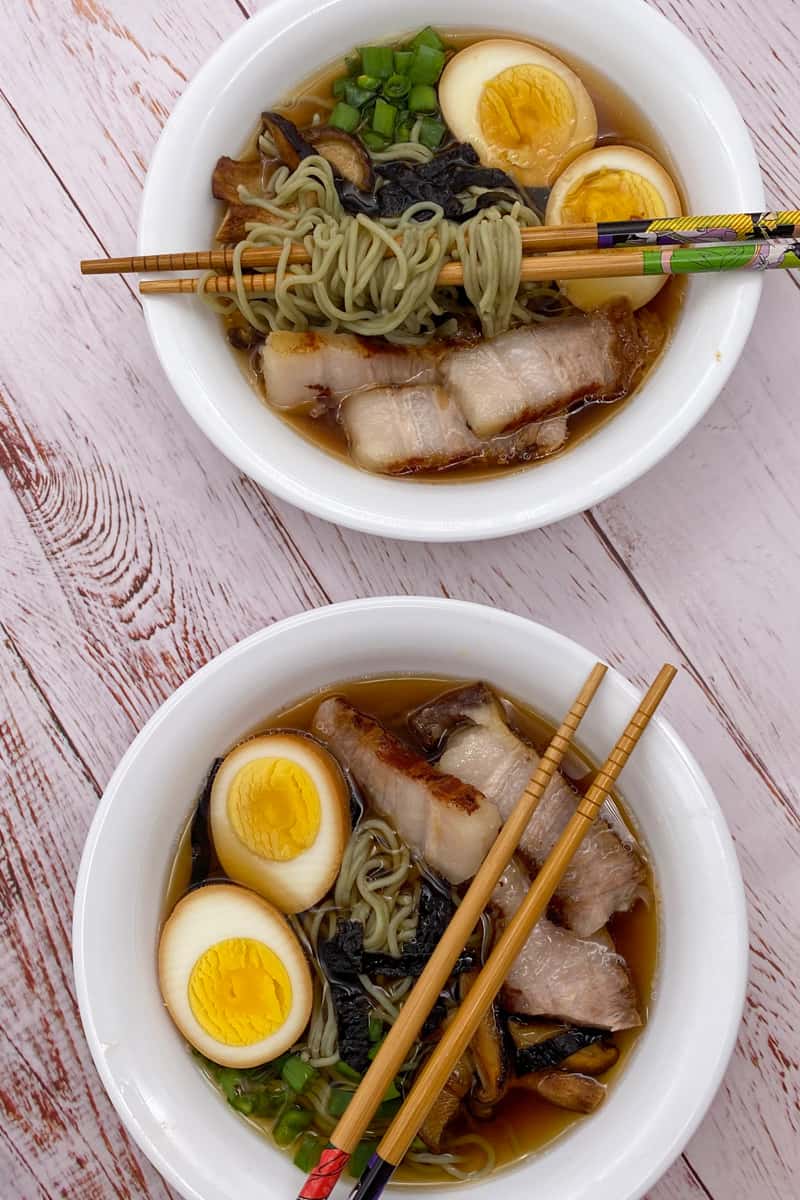 This Shoyu Ramen Recipe is made with pork belly, ramen, shitake mushrooms, kombu, bonito flakes, soft boiled eggs and scallions.