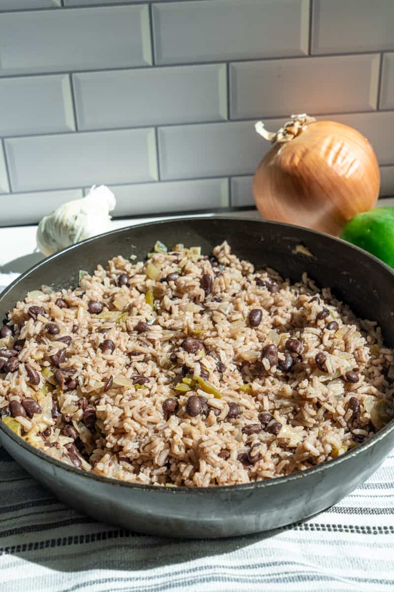 When the rice is done, fluff, and stir in the rest of the lime juice. Enjoy this Moro Rice. 