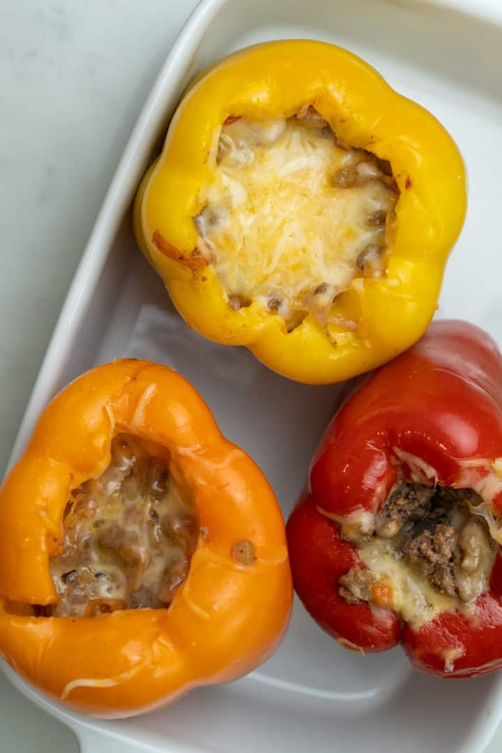 These Keto Stuffed Peppers are made with ground beef, onion, garlic, carrots, celery and tomatoes which are cooked and stuffed in bell peppers.