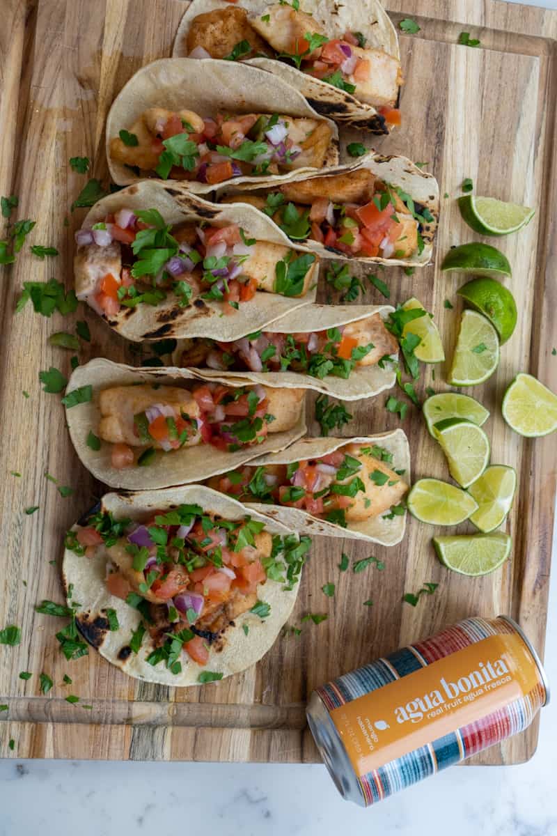 These Ensenada Fish Tacos served with Spicy Mayo are made with cod, flour, spices, corn tortillas and served with a delicious pico de gallo.