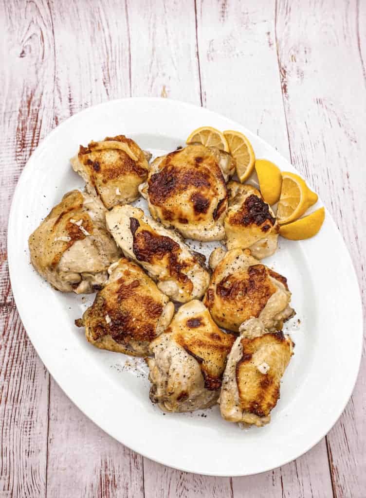 This Char Broil Chicken dish is made with chicken thighs, lemons, red wine vinegar, garlic, and seasoned with oregano.