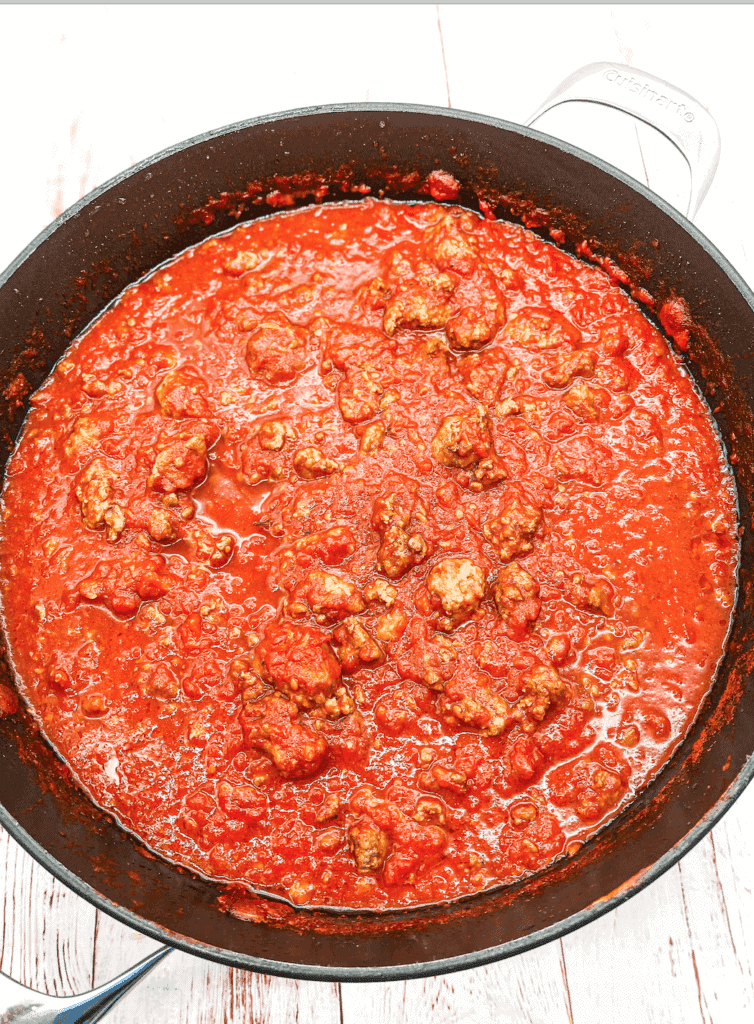 This Sausage and Meat Sauce is made with Sweet Italian Sausage, Lucanica Sausage and ground beef. This is a perfect, comfort meal.