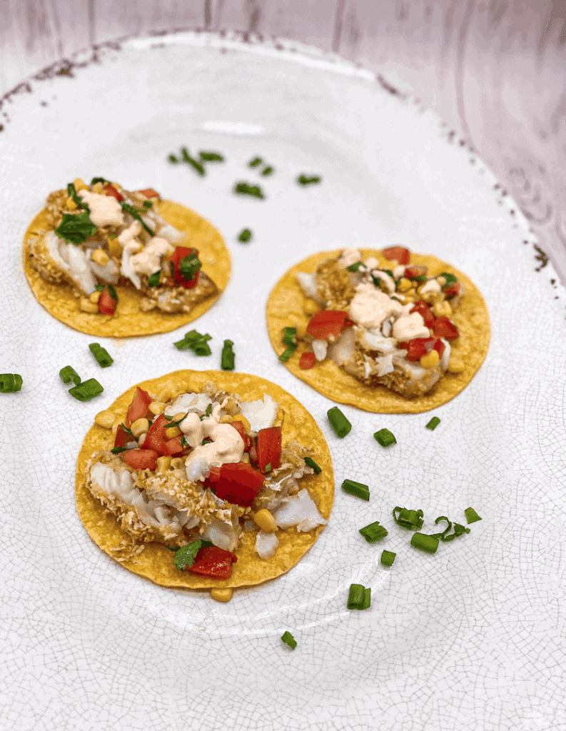 These Baja Tacos served with Spicy Mayo are made with cod, breadcrumbs, tortillas and served with a delicious corn slaw. 