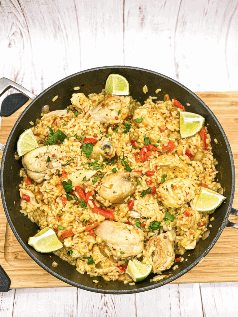 This Arroz con Pollo is made with arborio rice, drumsticks, adobo, sofrito, saffron, peppers, broth and white wine. 
