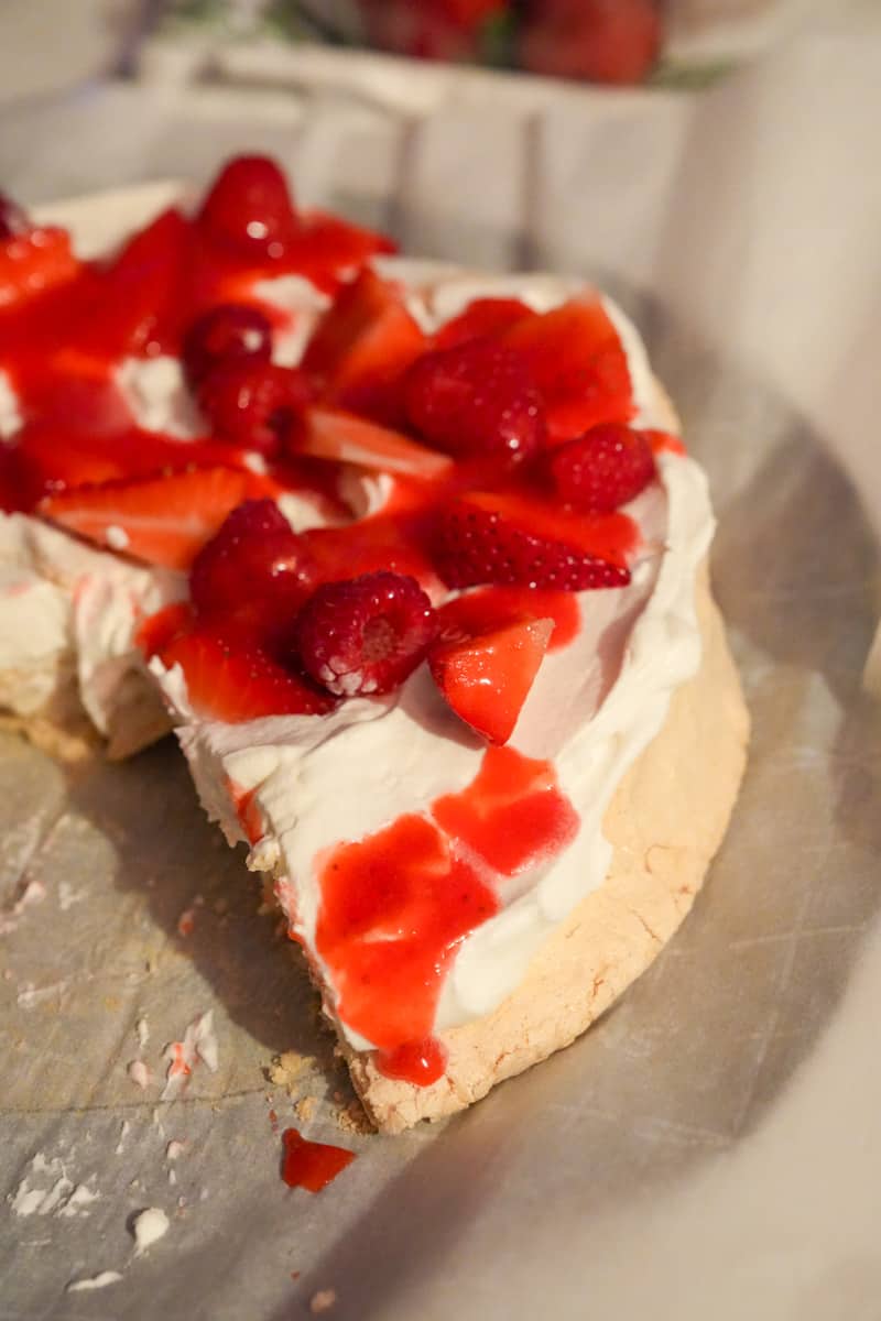 This Strawberry Pavlova Recipe is made with egg whites, sugar, vanilla, strawberries, heavy cream, cornstarch and apple cider vinegar.