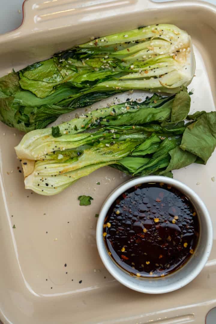 This Air Fried Bok Choy Recipe is made with sesame oil, soy sauce, garlic powder, air fried and served with a delicious honey soy sauce.