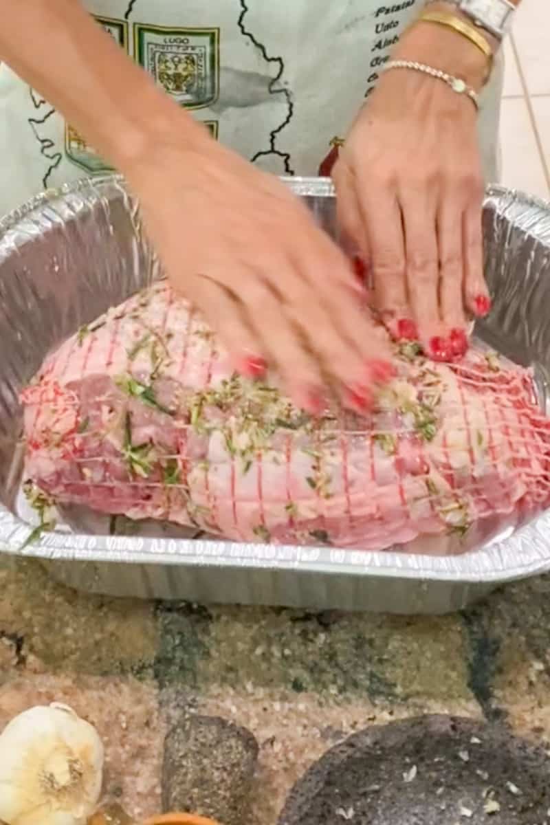 Cover the roasting pan or baking dish with aluminum foil and let the lamb marinate in the refrigerator for at least 2 hours, or overnight for even better flavor. Once marinated, remove the lamb from the refrigerator and let it sit at room temperature for about 30 minutes before cooking.