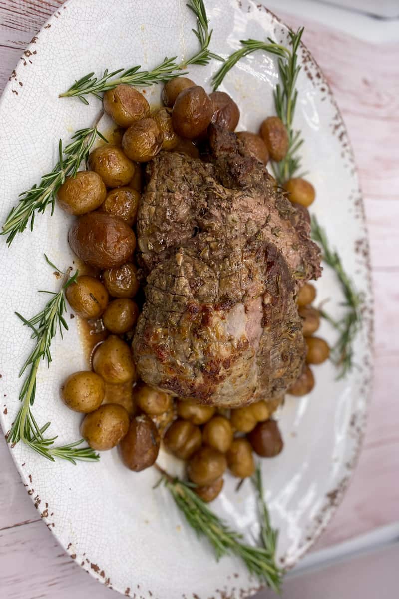 This Lamb Sirloin Roast is made with lamb, garlic, olive oil, fresh rosemary, lemon juice, red wine and roasted to perfection.