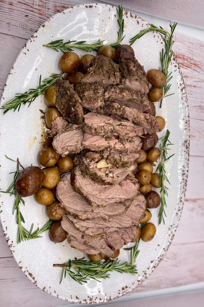 This Lamb Sirloin Roast is made with lamb, garlic, olive oil, fresh rosemary, lemon juice, red wine and roasted to perfection.