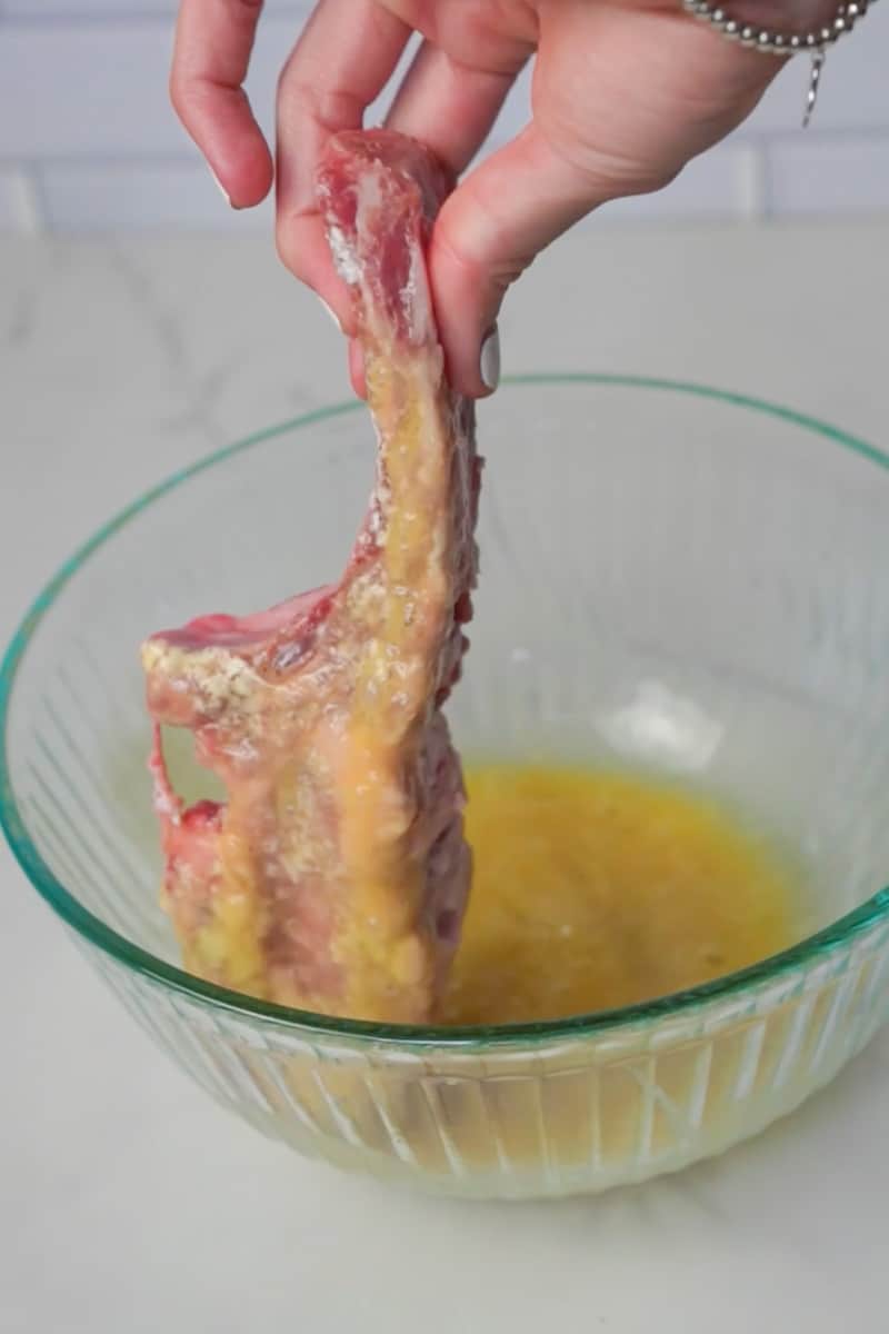 Dredge each pork chop in the flour, shaking off any excess. Then dip it into the egg mixture, allowing any excess to drip off. Finally, coat the chop with the breadcrumb mixture, pressing lightly to adhere the crumbs to the meat. Repeat this process with all the pork chops.