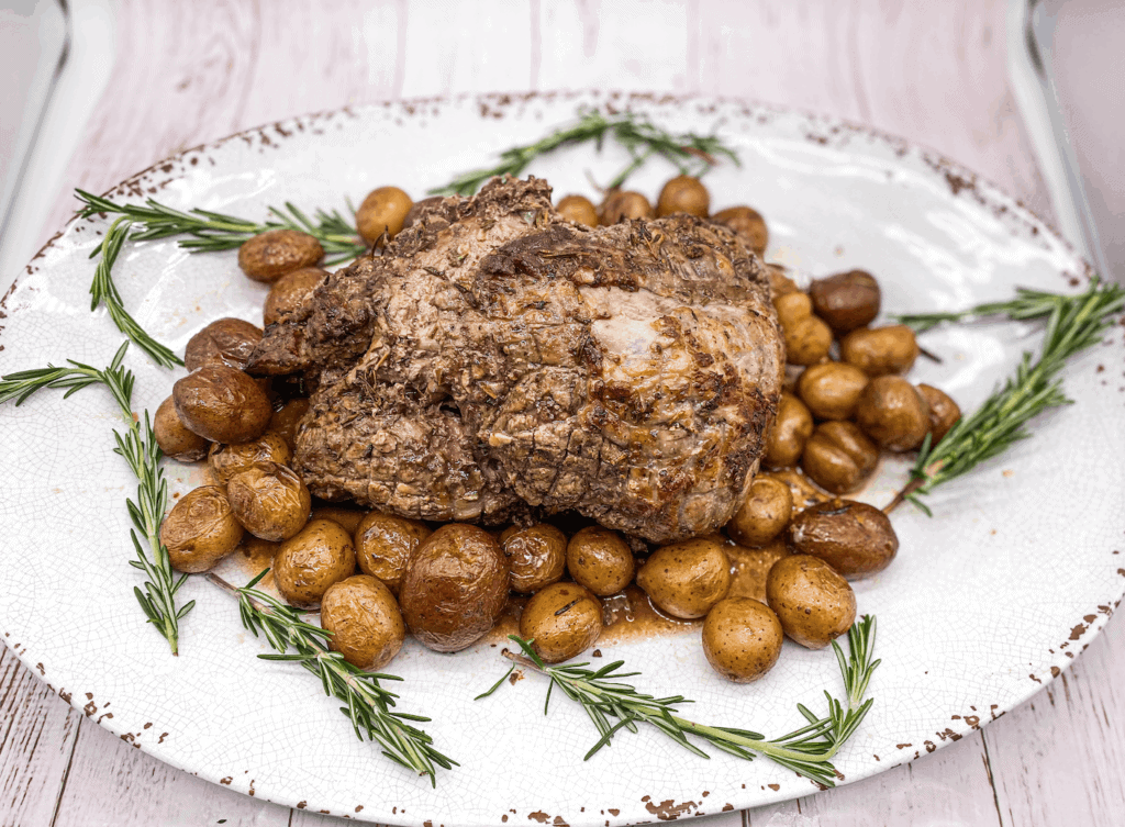 This Lamb Sirloin Roast is made with lamb, garlic, olive oil, fresh rosemary, lemon juice, red wine and roasted to perfection. 