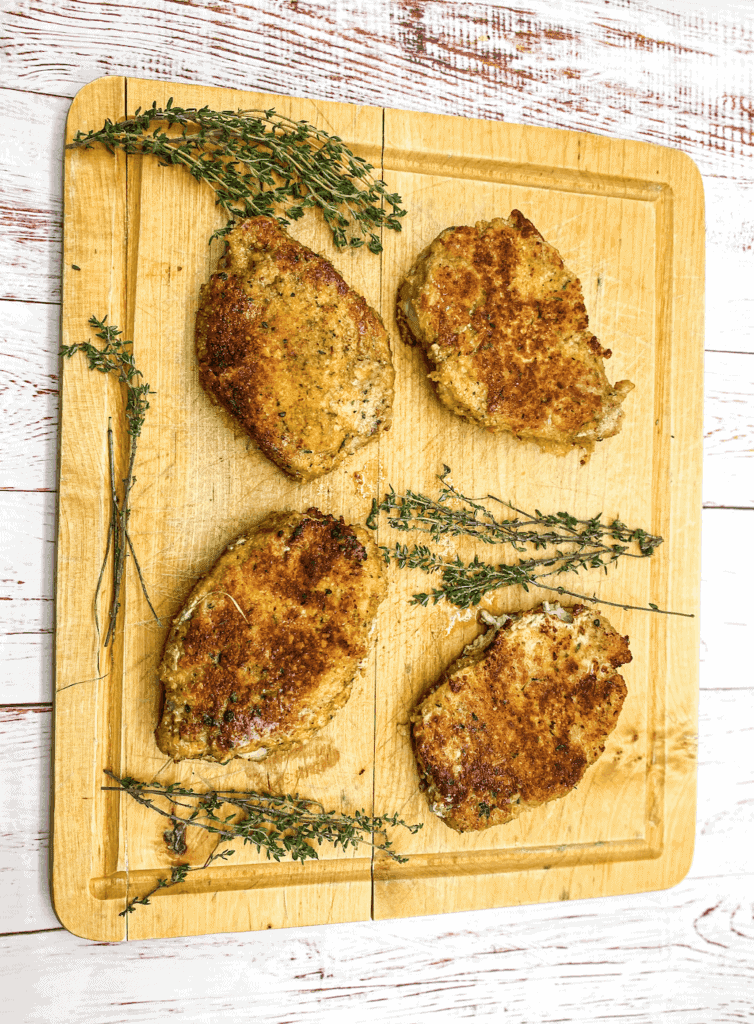 This Thyme Breaded Pork Chops dish is made with pork chops, flour, eggs, breadcrumbs, thyme leaves, and Worcestershire sauce.