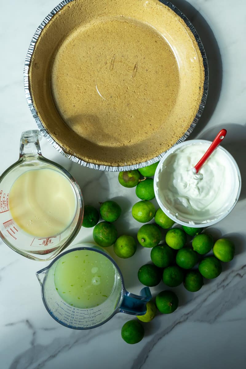 You'll only need a few simple ingredients to make this. The exact measurements are listed in the recipe card below. Here's an overview of what you'll need: Key limes
Condensed Milk
Sour cream
Gluten free Graham cracker pie crust
