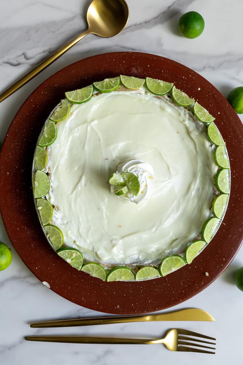 Put in the refrigerator immediately after and garnish with lime slices. Enjoy this Gluten Free Key Lime Pie.