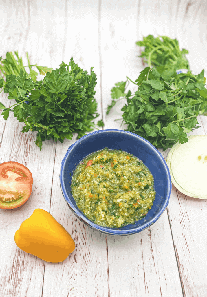There are many variations of homemade sofrito sauce: you can buy them red or you can buy them green. This Sofrito Goya Recipe is made with cilantro, parsley, onion, pepper, garlic, and tomato. 