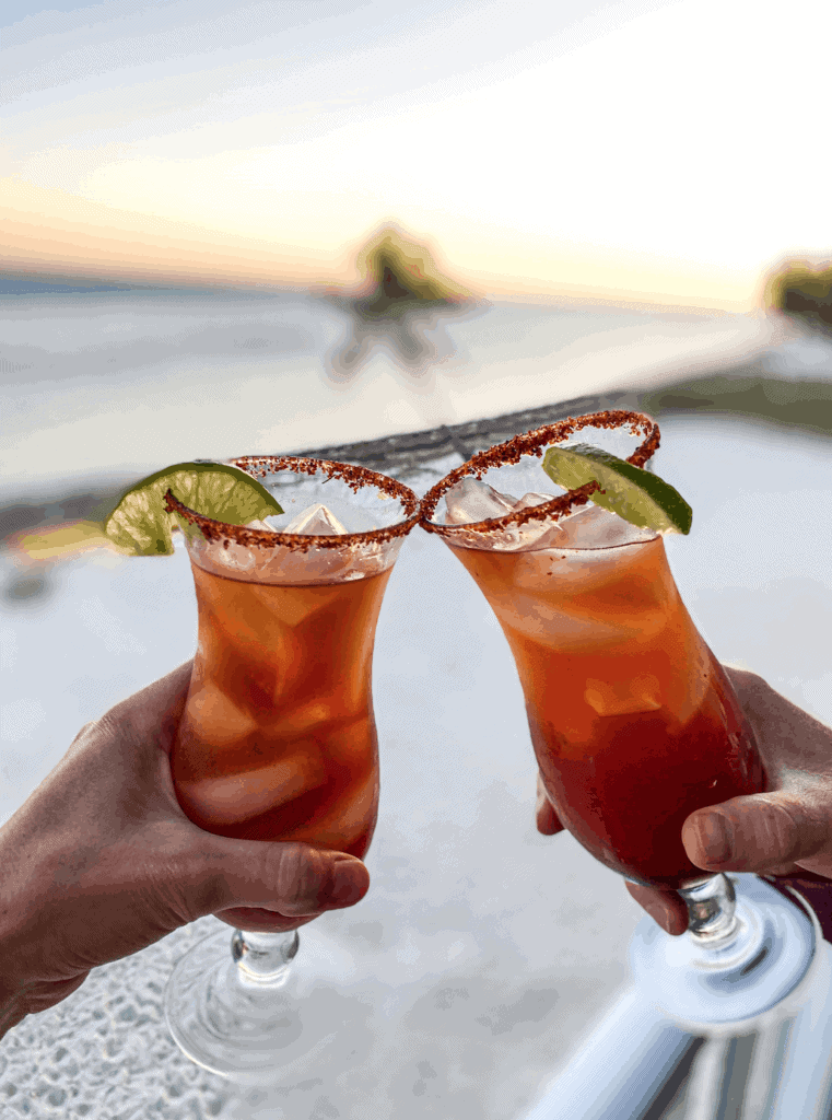 This Michelada Recipe is made with a Mexican beer, clamato juice, lime juice, Worcestershire sauce, and hot sauce.