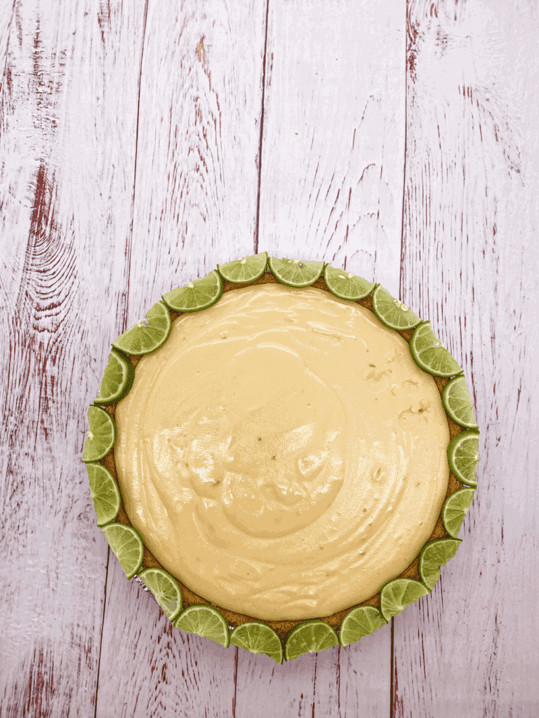 This is a Gluten Free Key Lime Pie that needs only 3 ingredients for the filling: condensed milk, key limes and sour cream!