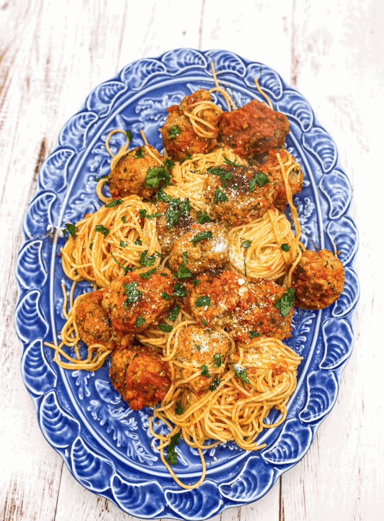 Want to make the most comforting Spaghetti and Meatballs? These meatballs are made with ground beef, ground pork, panko crumbs, parmesan, eggs, and parsley!