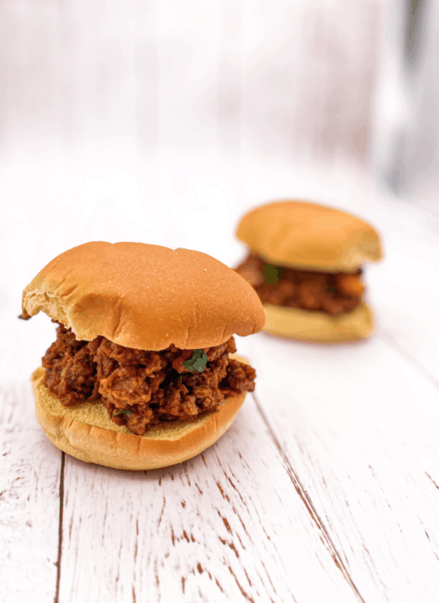 These Sloppy Joe Sliders are made with ground beef, tomato paste, broth, brown sugar, honey mustard, and served on a potato bun!