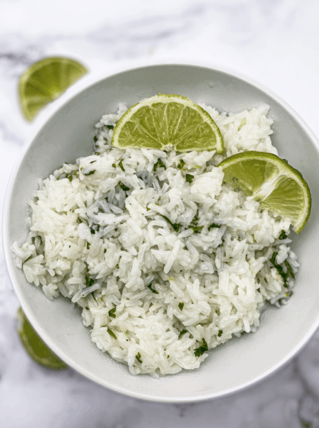 This is a Chipotle Copycat Cilantro Lime White Rice. To make this Chipotle Rice Instant Pot, you will need cilantro, limes, and salt.
