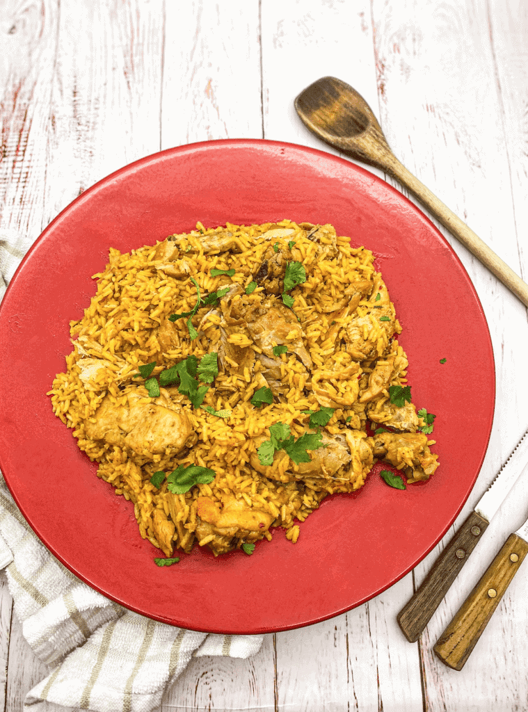 This Spicy Latin Chicken Paella is the best combination of Spanish Paella with saffron with an added Latin twist by adding sazón.