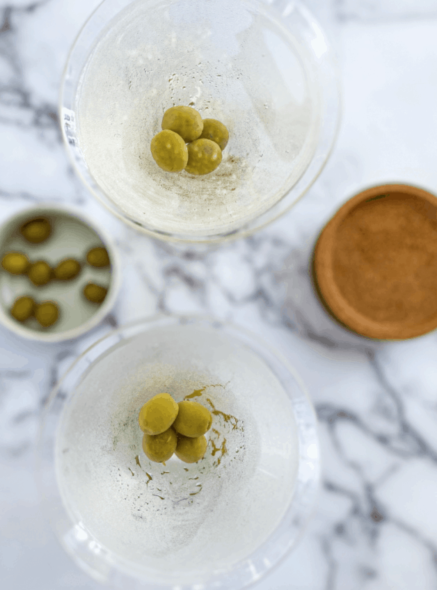 This dirty martini has a pleasant saltiness due to the olive juice, which is where the cocktail inherits its name.