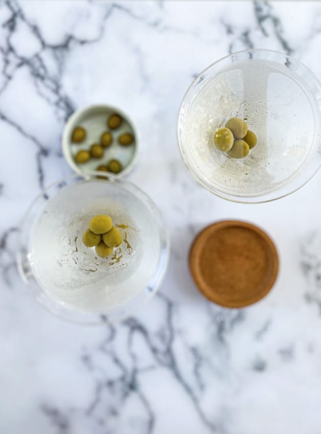This dirty martini has a pleasant saltiness due to the olive juice, which is where the cocktail inherits its name.