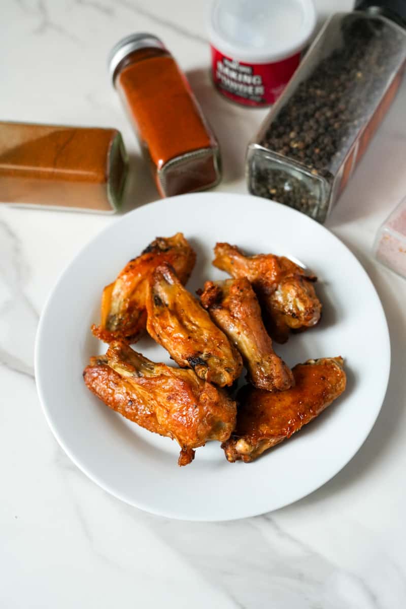 This Baked Chicken Wings Recipe is made with paprika, chili powder, and baking powder are great because they are crispy on the outside and juicy on the inside, with a delicious blend of spices that give them a bold and savory flavor.