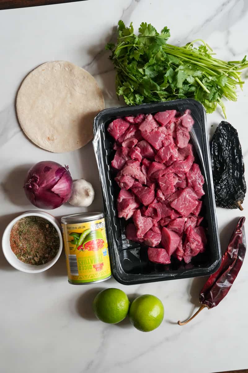 These Birria Tacos recipe comes from my parent's home in Jalisco, Mexico which is served with the stew the beef was previously cooked in.