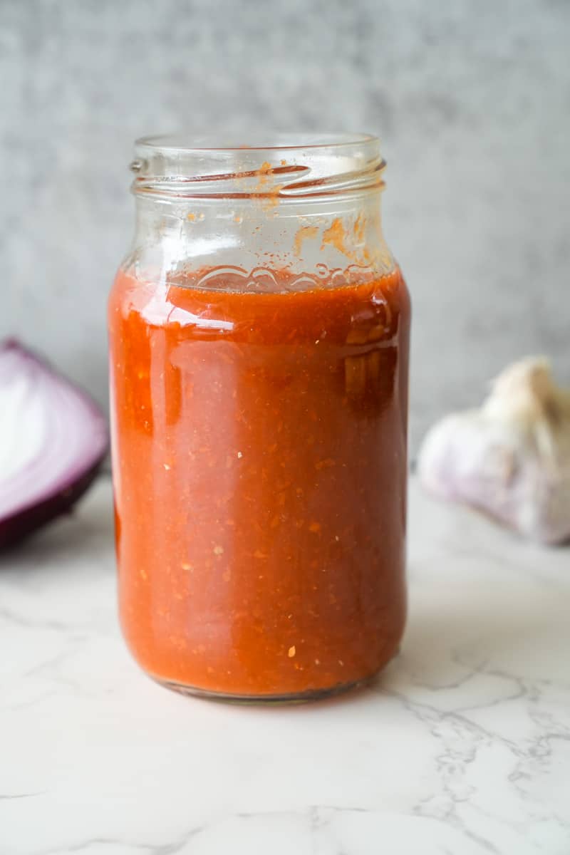 This Guajillo Sauce Recipe is made with guajillo chiles, garlic, onion, tomatoes, oregano, boiled and blended to perfection. 