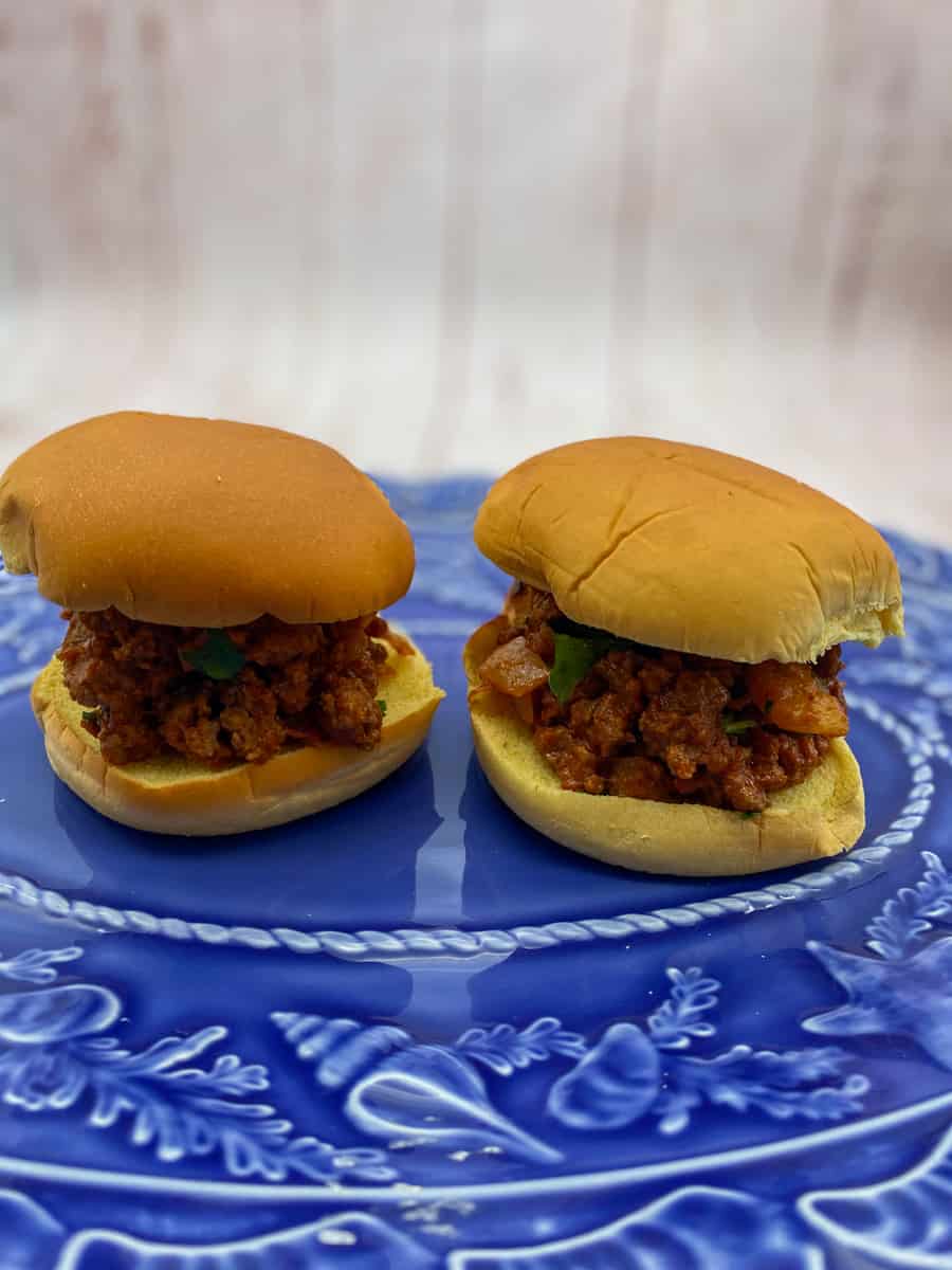 Garnish with parsley leaves and serve on slider buns. Enjoy this Sloppy Joes Recipe. 