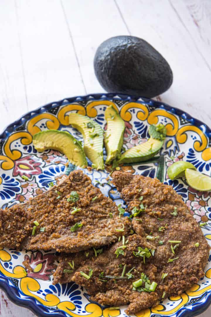 This is a Milanesa Recipe that is made by dipping thin-cut sirloin in eggs, tossing in bread crumbs, and then lightly frying.