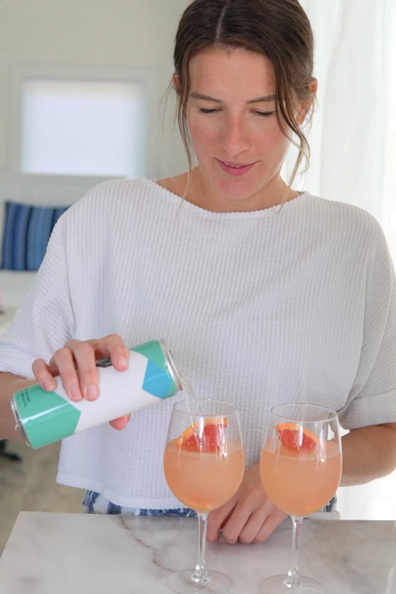 Fill a glass with ice cubes and strain the cocktail mixture into the glass. Top it off with spiked seltzer water to add a bubbly and effervescent touch.