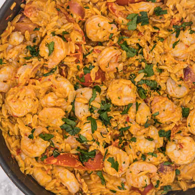 This One-Pot Shrimp Orzo with Harissa and Tahini is made with shrimp, onion, bell pepper, orzo, white wine, harissa and tahini and a great Shrimp with Pasta Recipes.