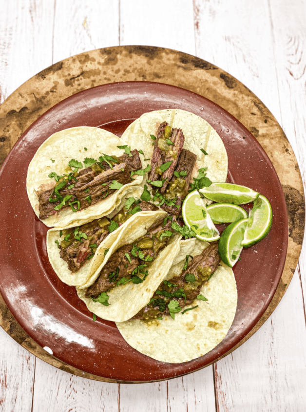 These Carne Asada Tacos are everything you have ever dreamed of. This Carne Asada dish is marinated in olive oil, soy sauce, onion, jalapeños, and so many spices.