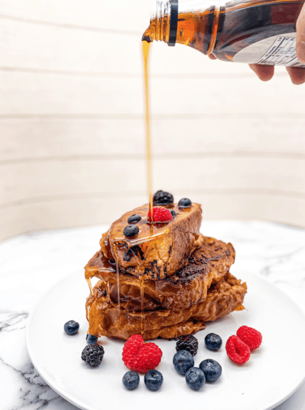 This French Toast Recipe is a restaurant style French toast made with eggs, milk, bourbon, and sprinkled with cinnamon sugar.