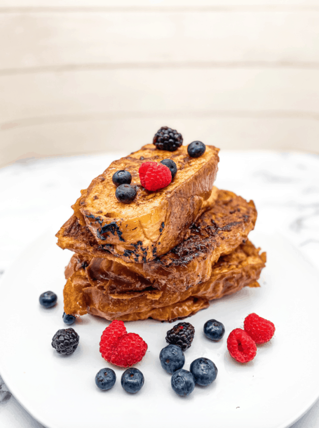 This French toast is a restaurant style French toast made with eggs, milk, bourbon, and sprinkled with cinnamon sugar.
