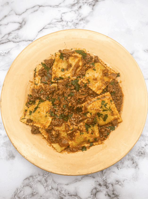 This Beef Ravioli Sauce recipe is made with homemade meat sauce and raviolis. This sauce is simmered into perfection!