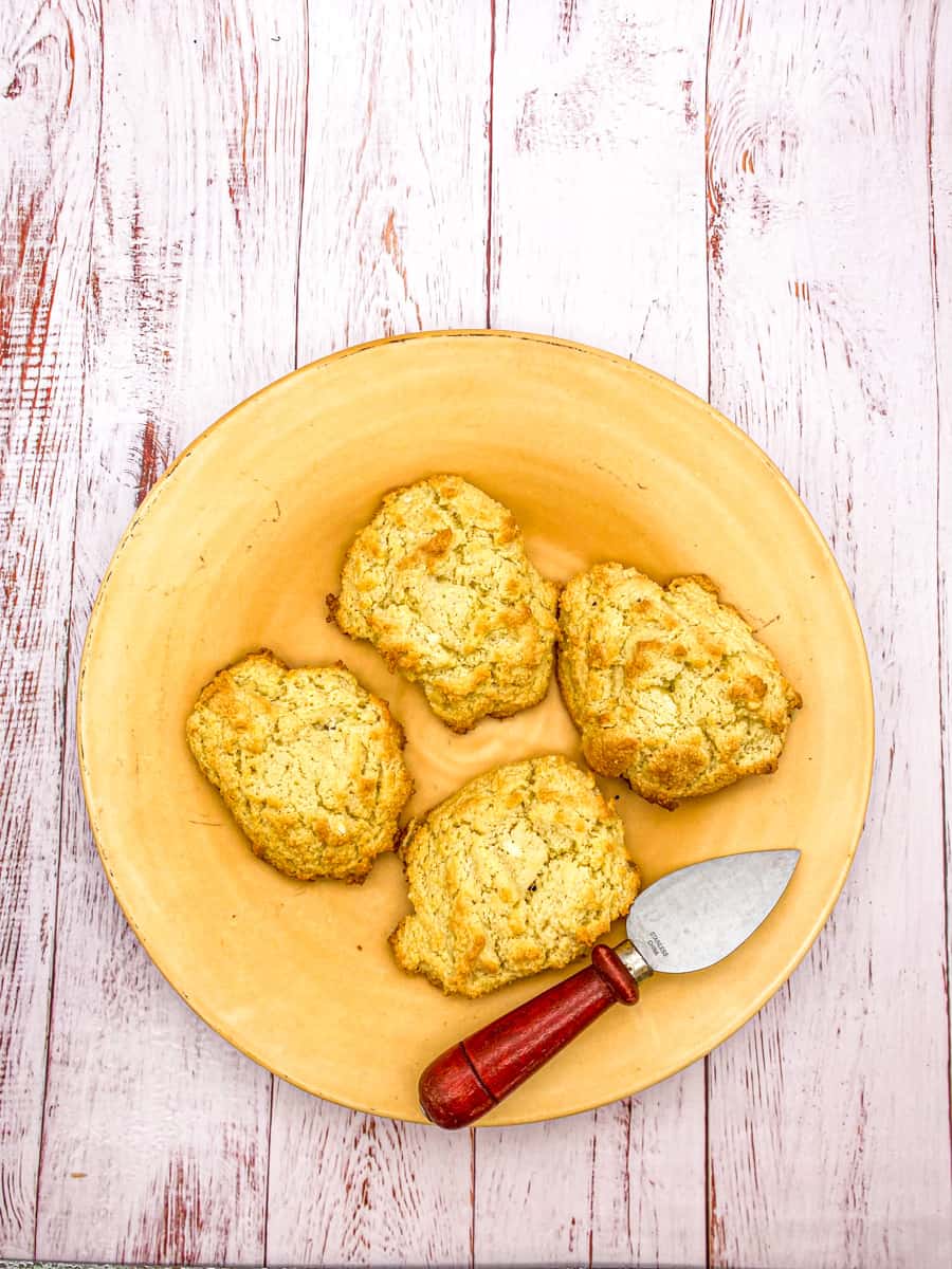 This Keto Biscuits Recipe is made with almond flour, baking powder, heavy whipping creams, eggs and butter and baked to perfection.