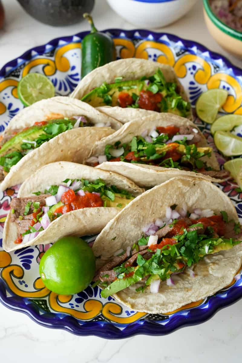 Serve with lime wedges. Enjoy this Carne Asada Tacos Recipe.