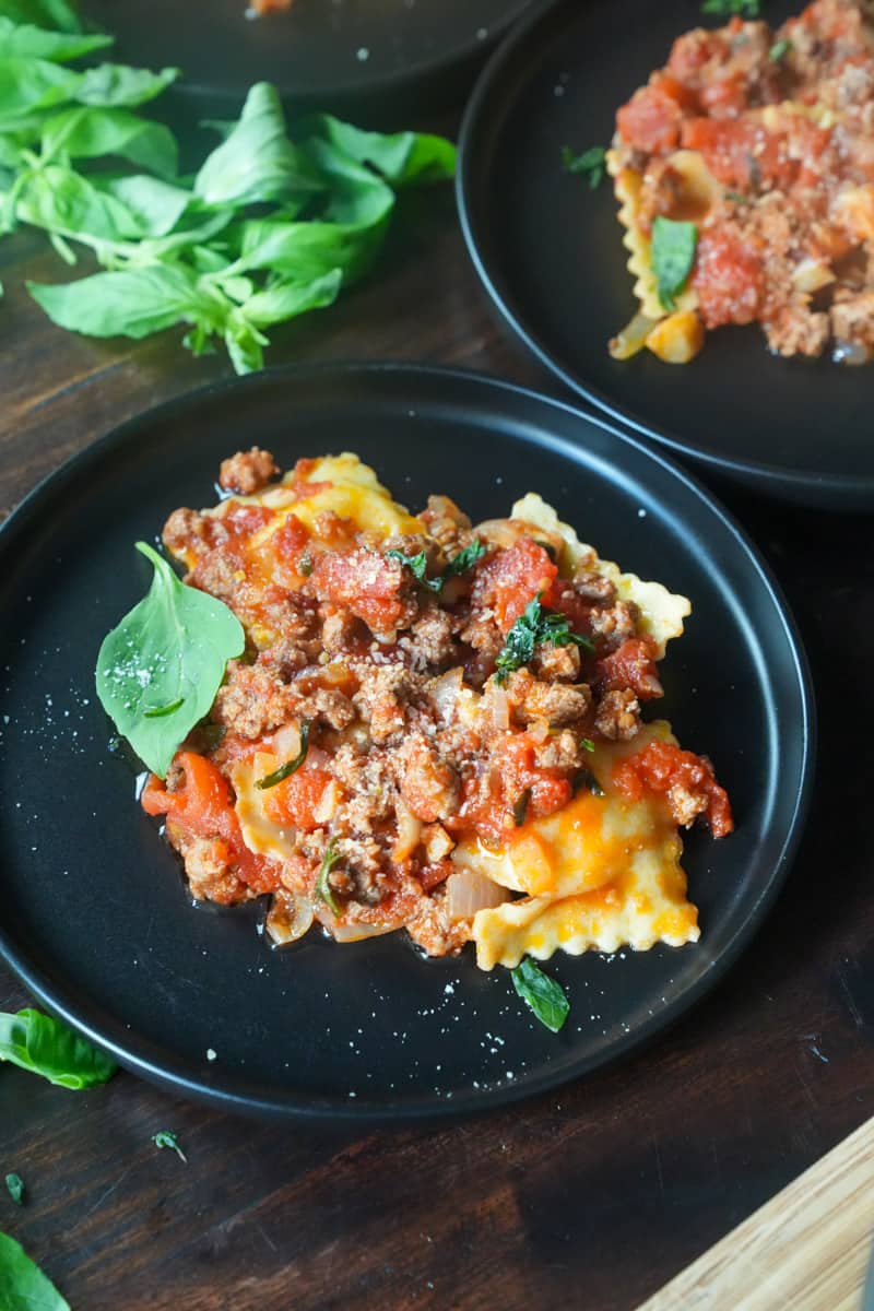 This Beef Ravioli Sauce is made with onion, garlic, beef, crushed tomatoes, basil and store bought ravioli.