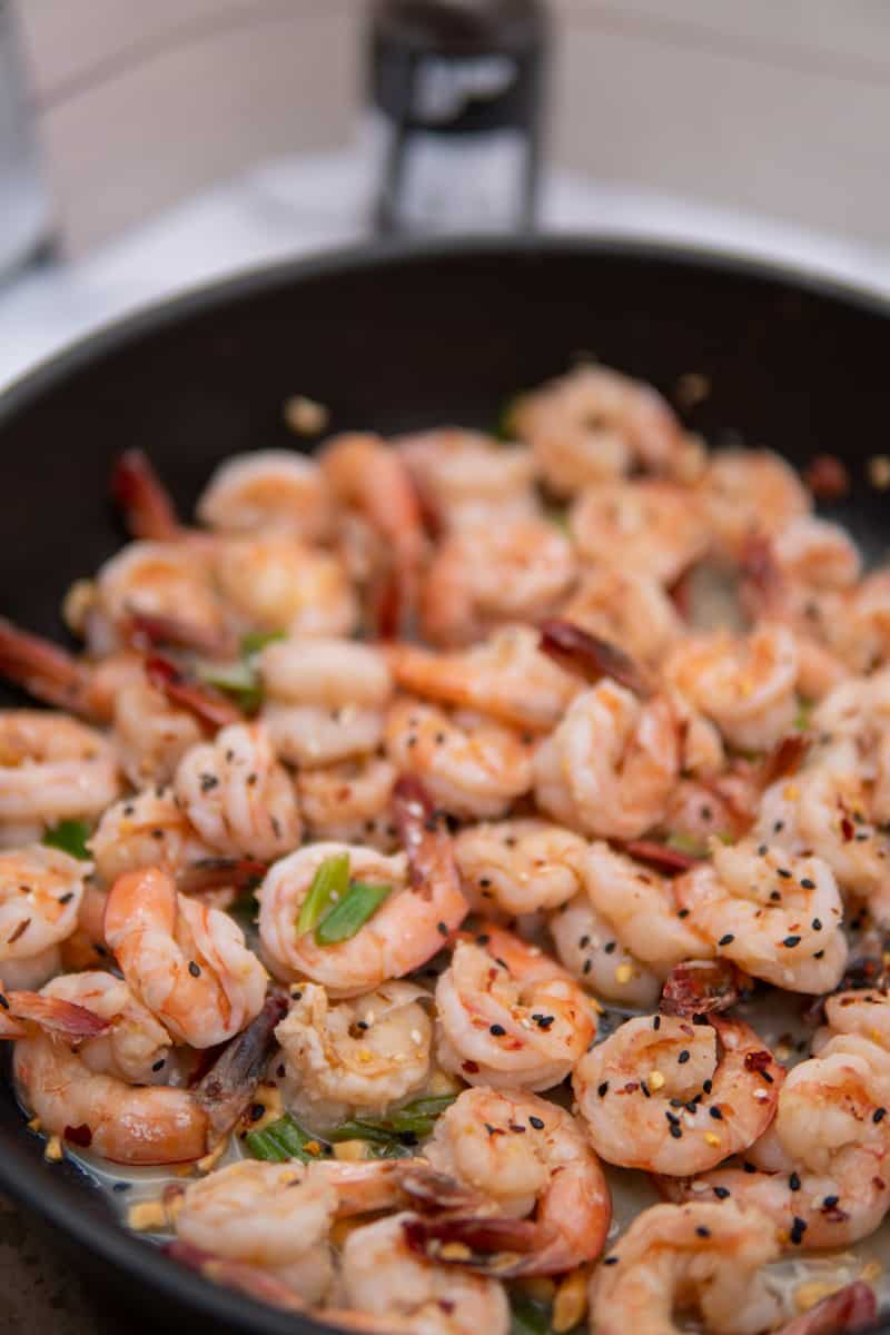 This Sweet and Sour Shrimp Recipe has peanuts, scallions and lime juice, red pepper flakes, fish sauce, rice vinegar and sugar.