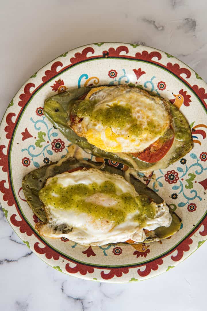 This Tomato, Egg, and Cheese on a Nopal is made with oil, cactus paddles, tomatoes, salsa verde, and eggs anyway you want them.